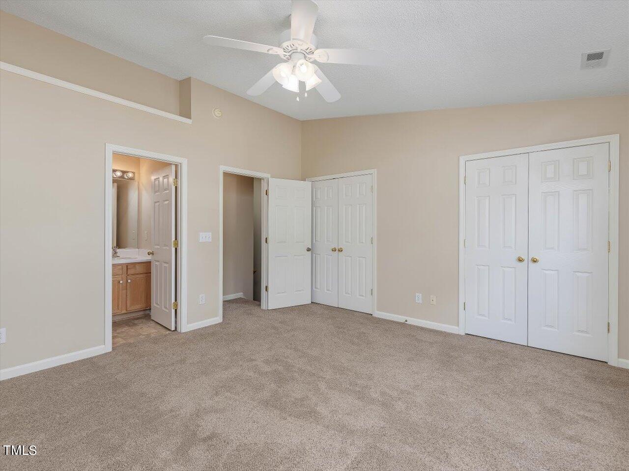 5402 Patuxent Drive Raleigh, NC 27616 - Photo 10 of 27 a view of an empty room with a ceiling fan