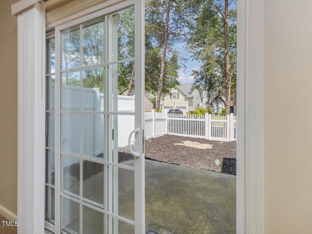 5402 Patuxent Drive Raleigh, NC 27616 - Photo 14 of 27 a room with a window and front door