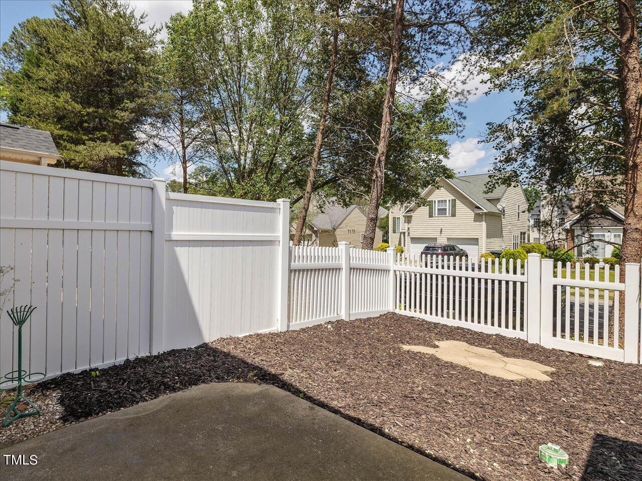 5402 Patuxent Drive Raleigh, NC 27616 - Photo 15 of 27 a backyard of a house