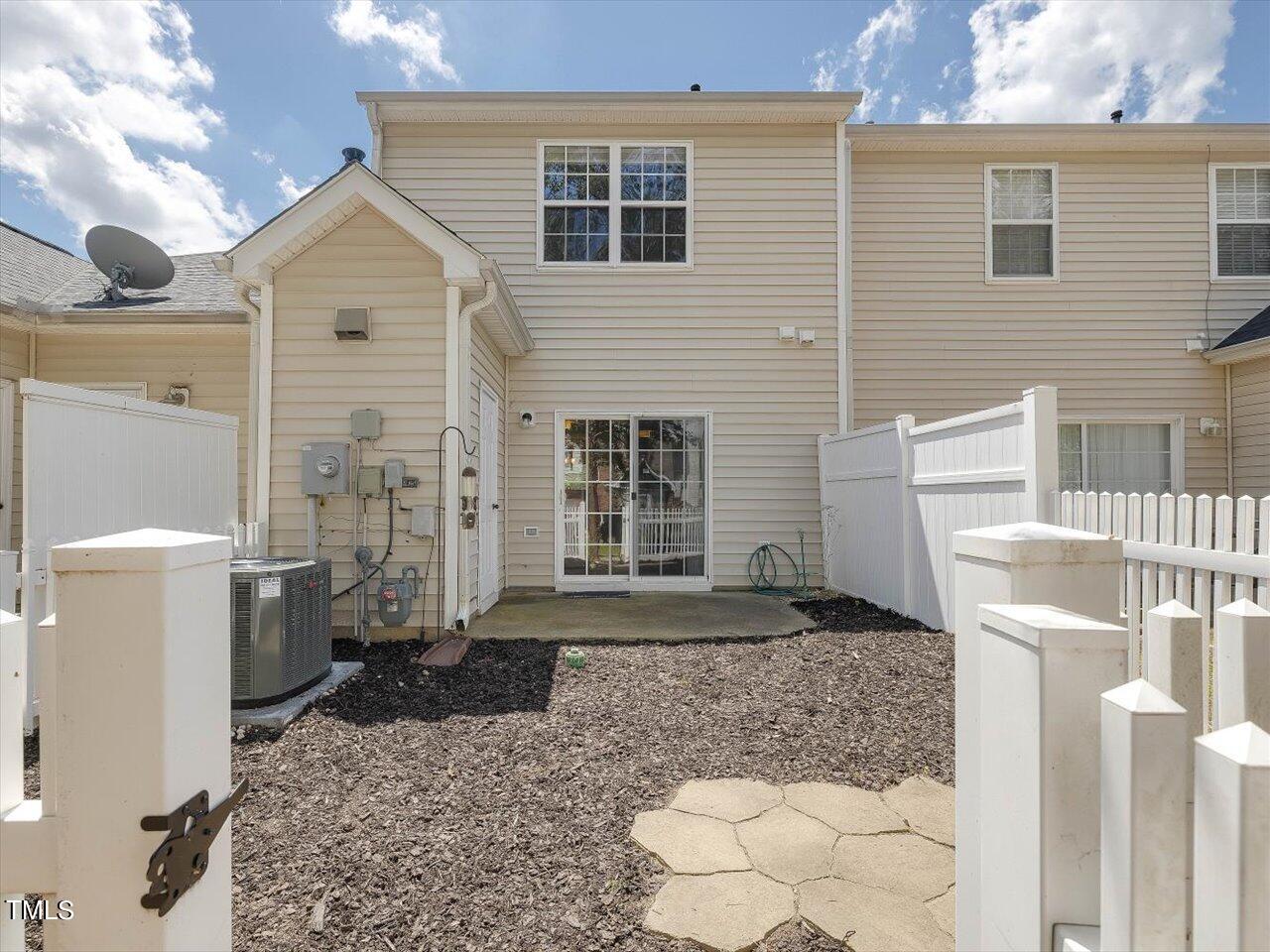 5402 Patuxent Drive Raleigh, NC 27616 - Photo 17 of 27 a front view of a house with a yard