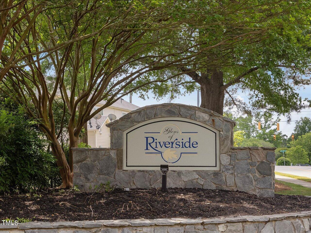 5402 Patuxent Drive Raleigh, NC 27616 - Photo 19 of 27 a sign board with a tree in the yard
