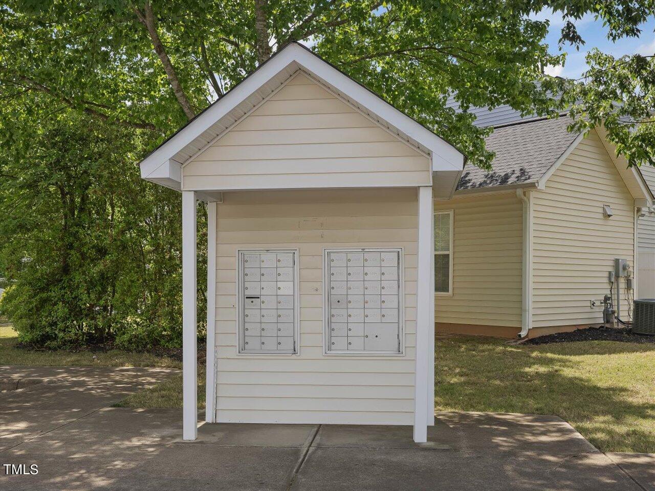 5402 Patuxent Drive Raleigh, NC 27616 - Photo 20 of 27 a front view of a house with a yard