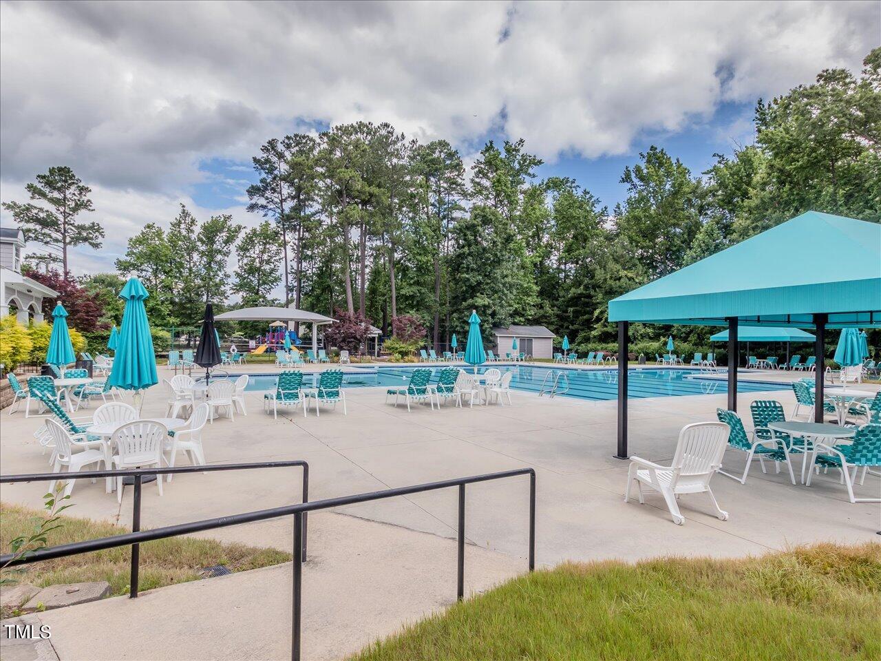 5402 Patuxent Drive Raleigh, NC 27616 - Photo 22 of 27 a view of a backyard with sitting area