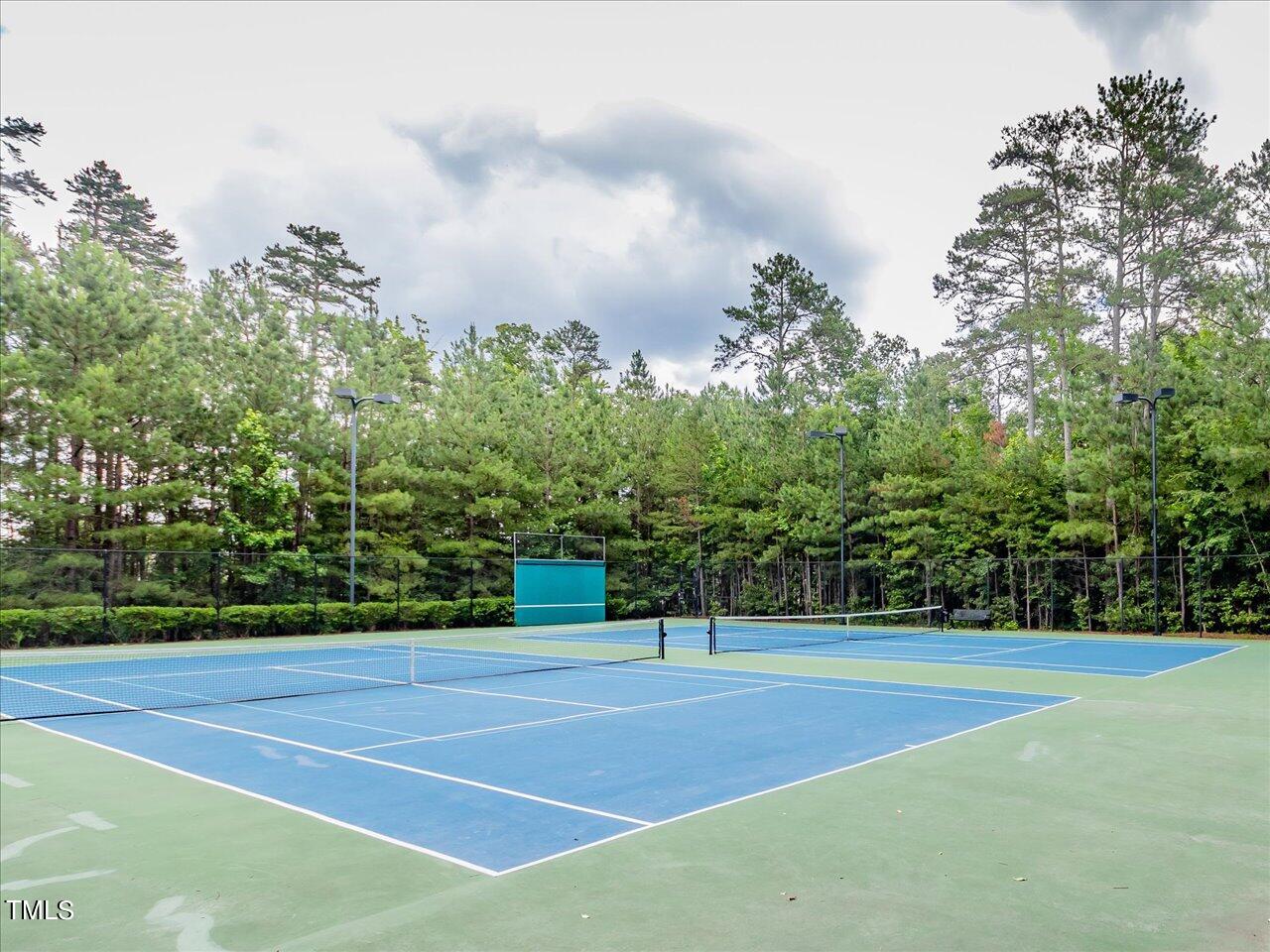 5402 Patuxent Drive Raleigh, NC 27616 - Photo 25 of 27 a view of a tennis court