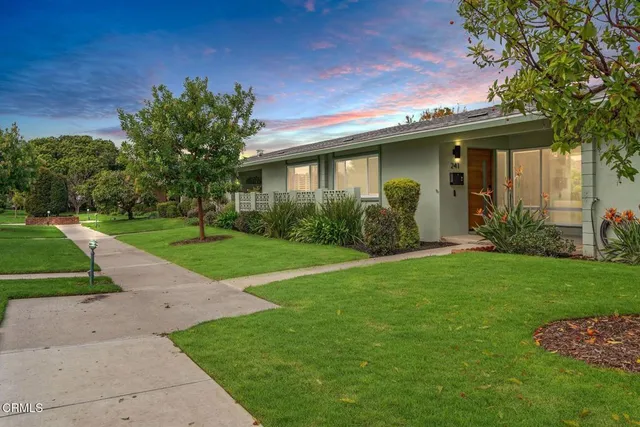 a view of a yard in front of house