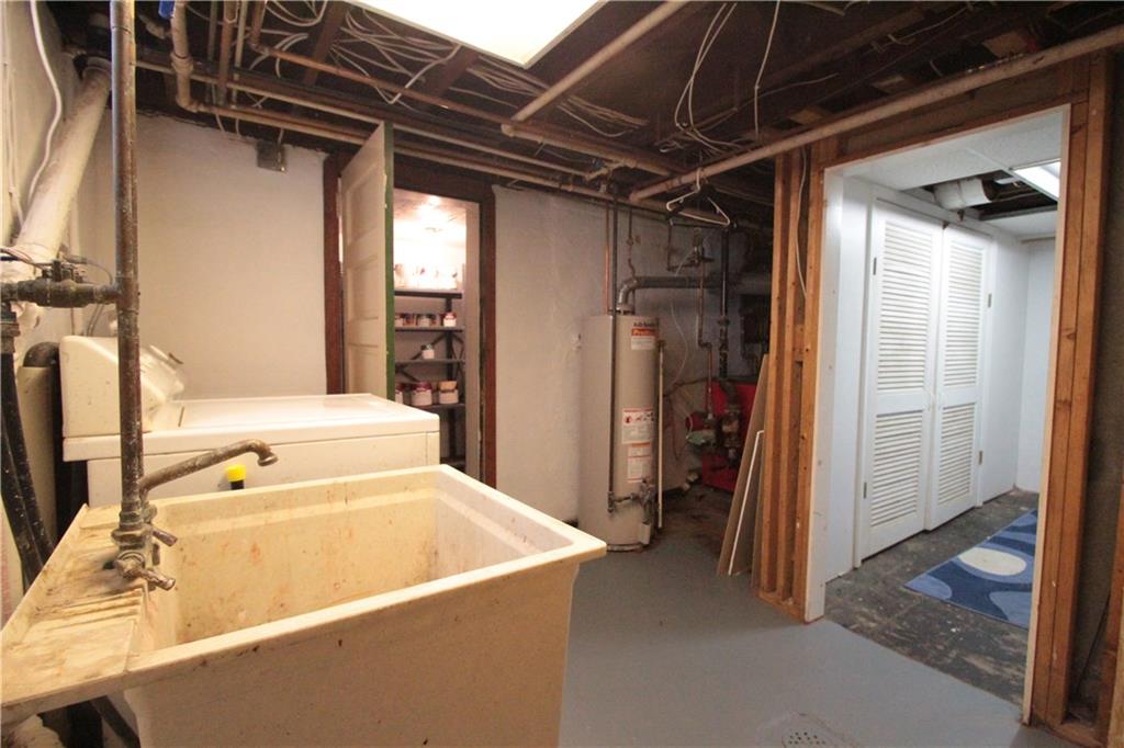 144 Ridgewood Road Pittsburgh, PA 15237 - Photo 20 of 22 Spacious laundry room, with additional storage room.