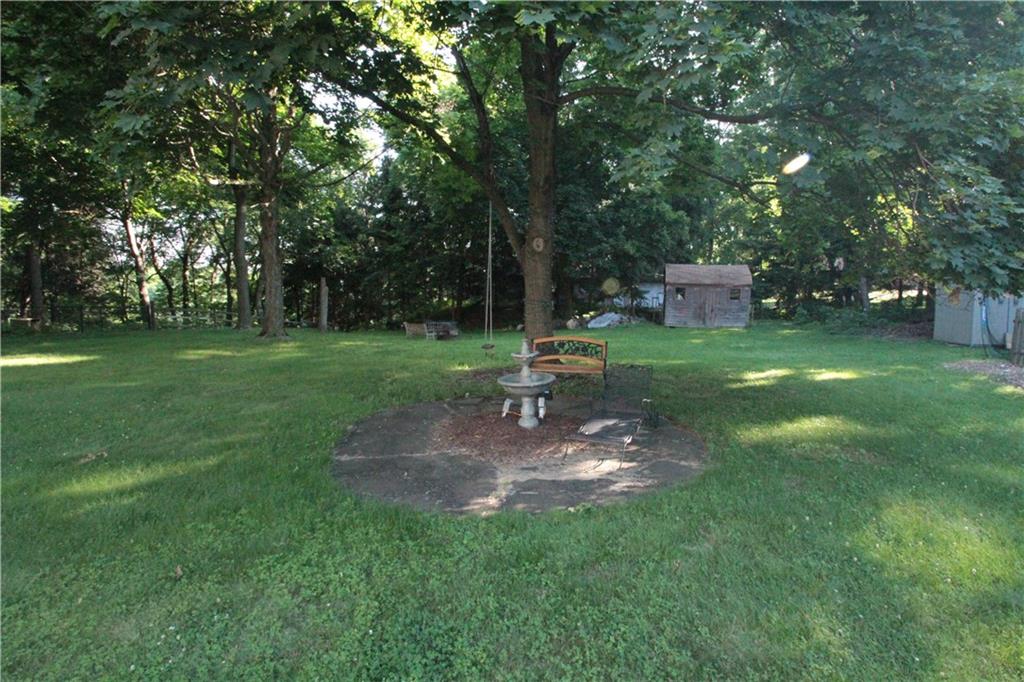 144 Ridgewood Road Pittsburgh, PA 15237 - Photo 21 of 22 Make no mistake, this is not a park, this is the large level backyard with beautiful mature shade trees! Sit, relax, and enjoy the fountain!