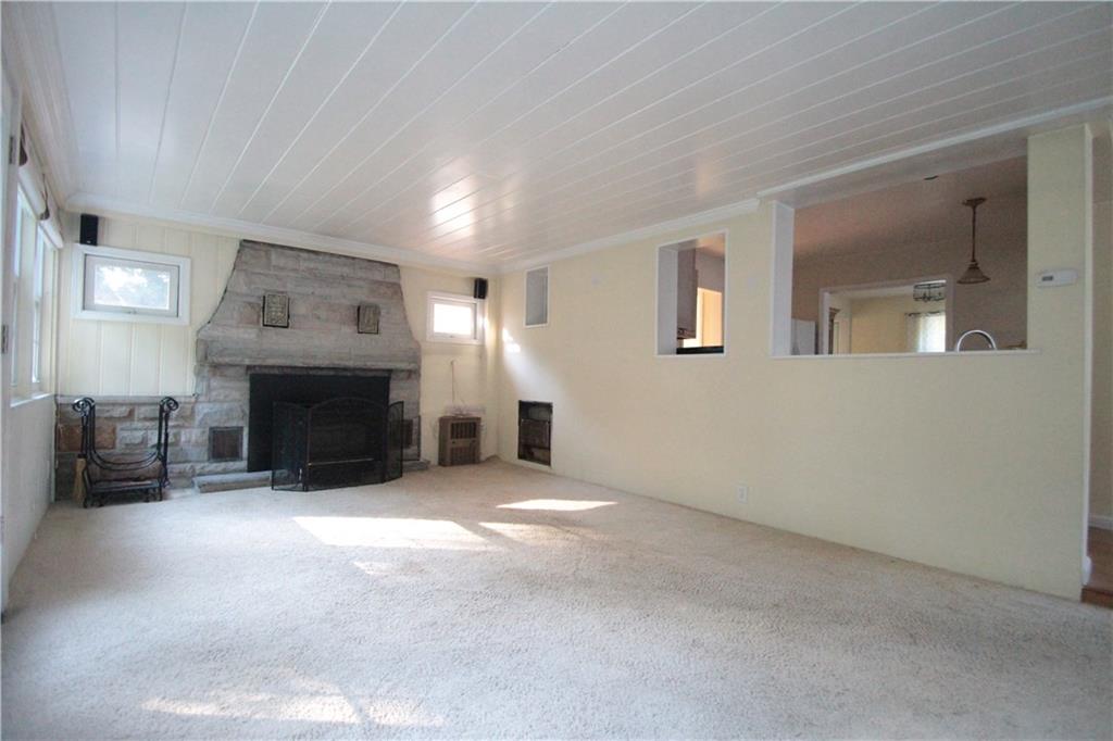 144 Ridgewood Road Pittsburgh, PA 15237 - Photo 9 of 22 Family room with wood burning stone fireplace!