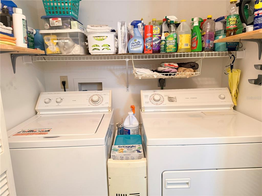 9394 Southwest 97th Lane, Unit A Ocala, FL 34481 - Photo 20 of 22 a utility room with dryer and washer