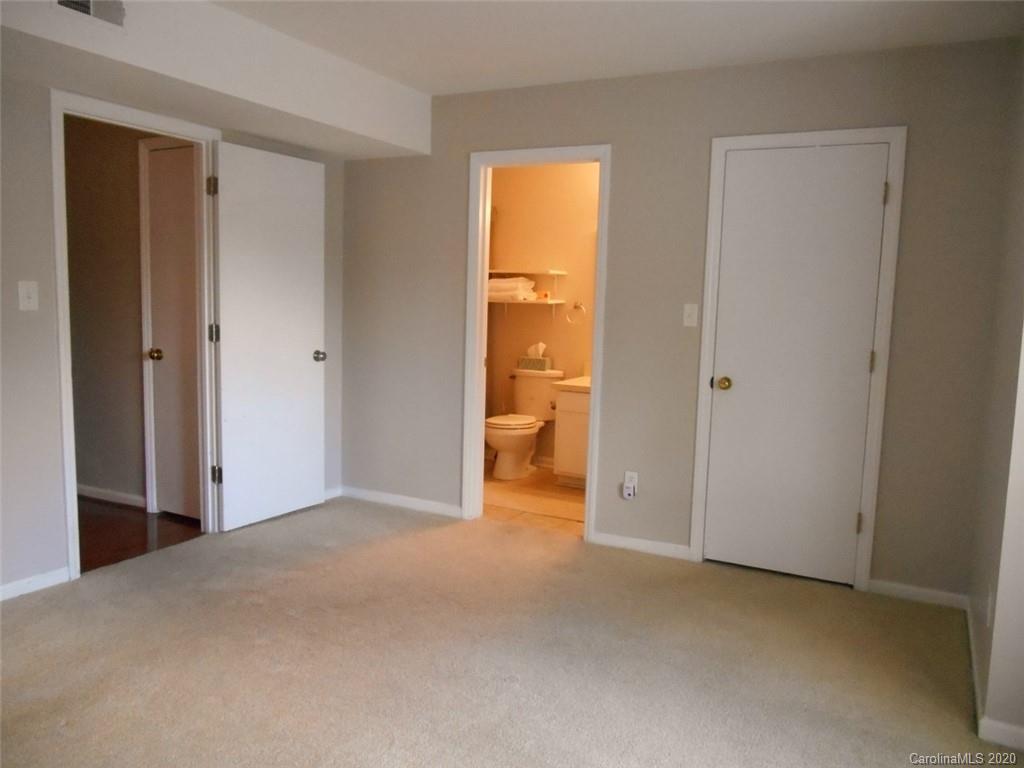 11183 Harrowfield Road Charlotte, NC 28226 - Photo 13 of 20 a view of an empty room with a window