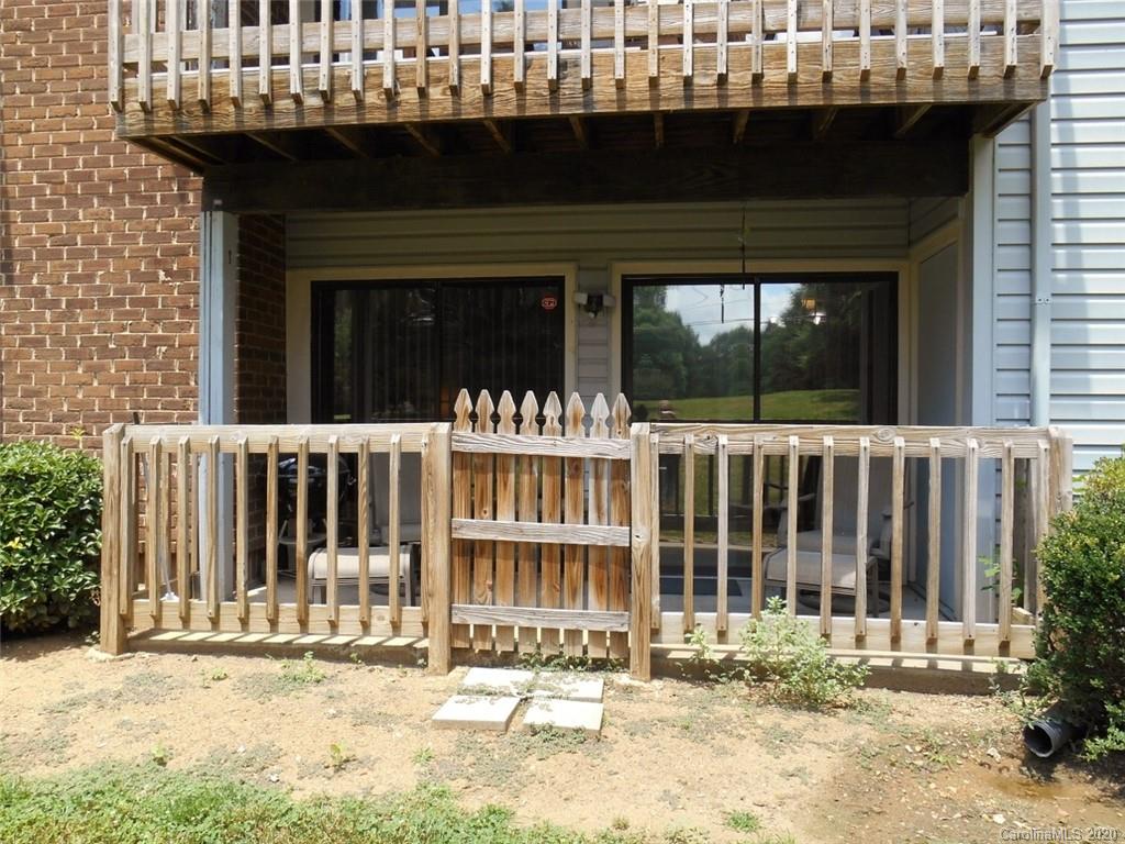 11183 Harrowfield Road Charlotte, NC 28226 - Photo 20 of 20 a front view of a house with a outdoor view