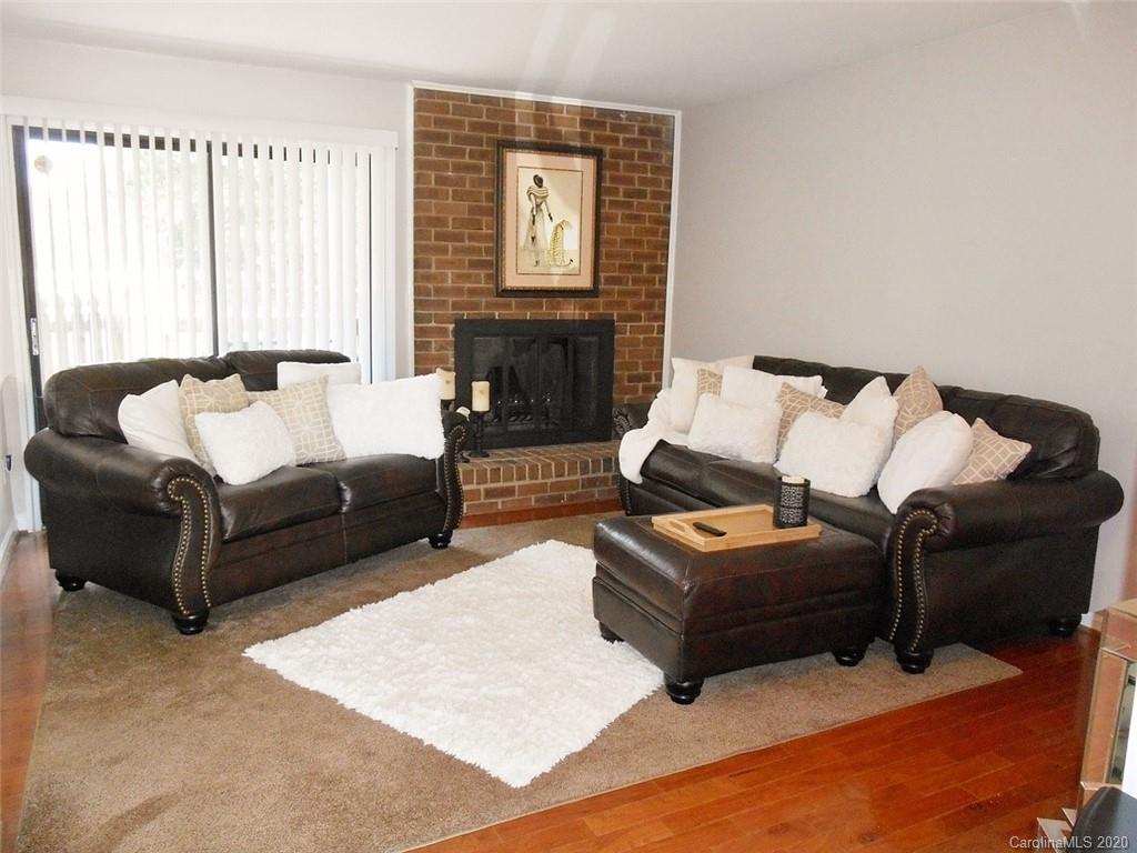 11183 Harrowfield Road Charlotte, NC 28226 - Photo 5 of 20 a living room with furniture and a large window