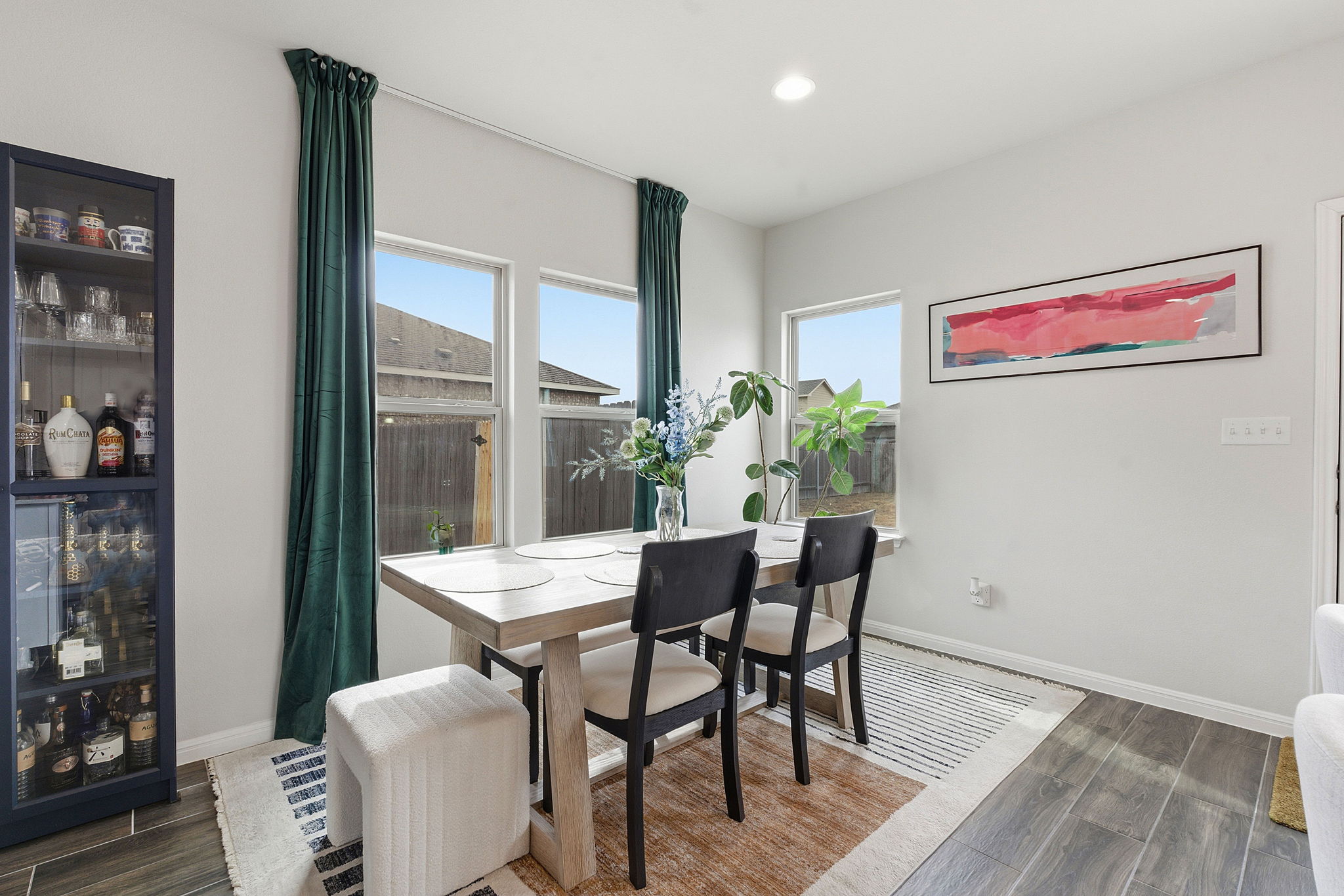 12413 Ostrich Trail Manor, TX 78653 - Photo 15 of 29 Dining area featuring wood tiled floors and recessed lighting