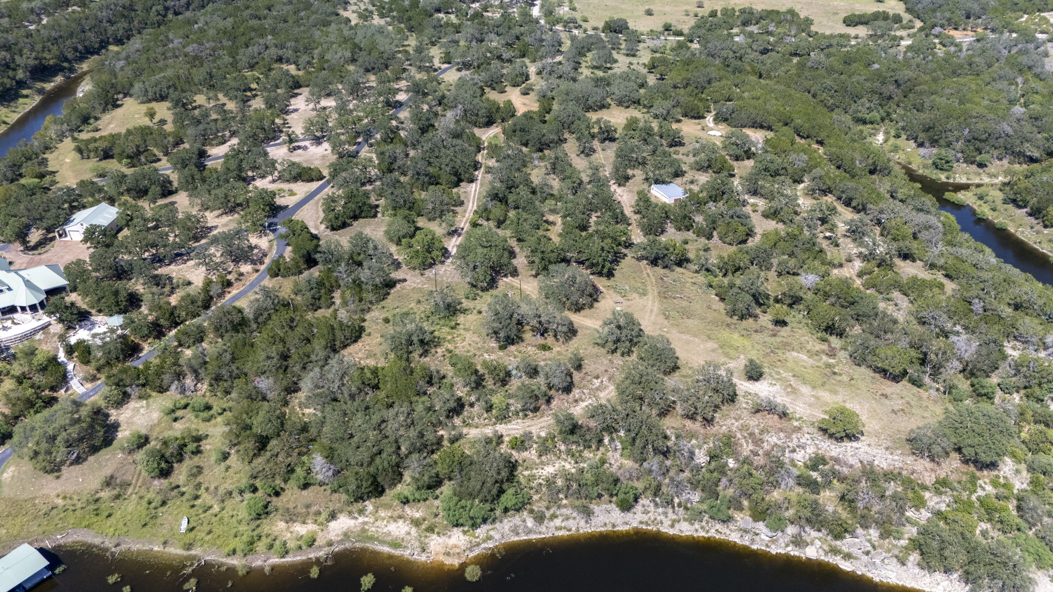Tbd Singleton Road Marble Falls, TX 78654 - Photo 16 of 40 an aerial view of a houses with a yard
