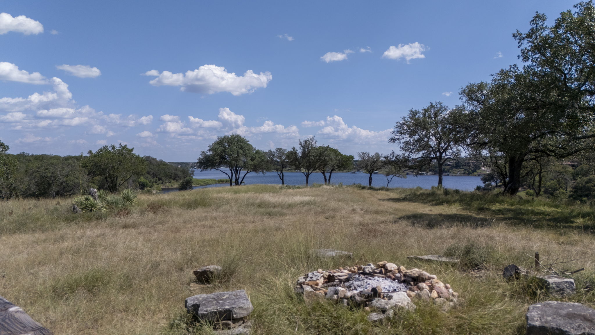 Tbd Singleton Road Marble Falls, TX 78654 - Photo 19 of 40 a view of a lake with a yard