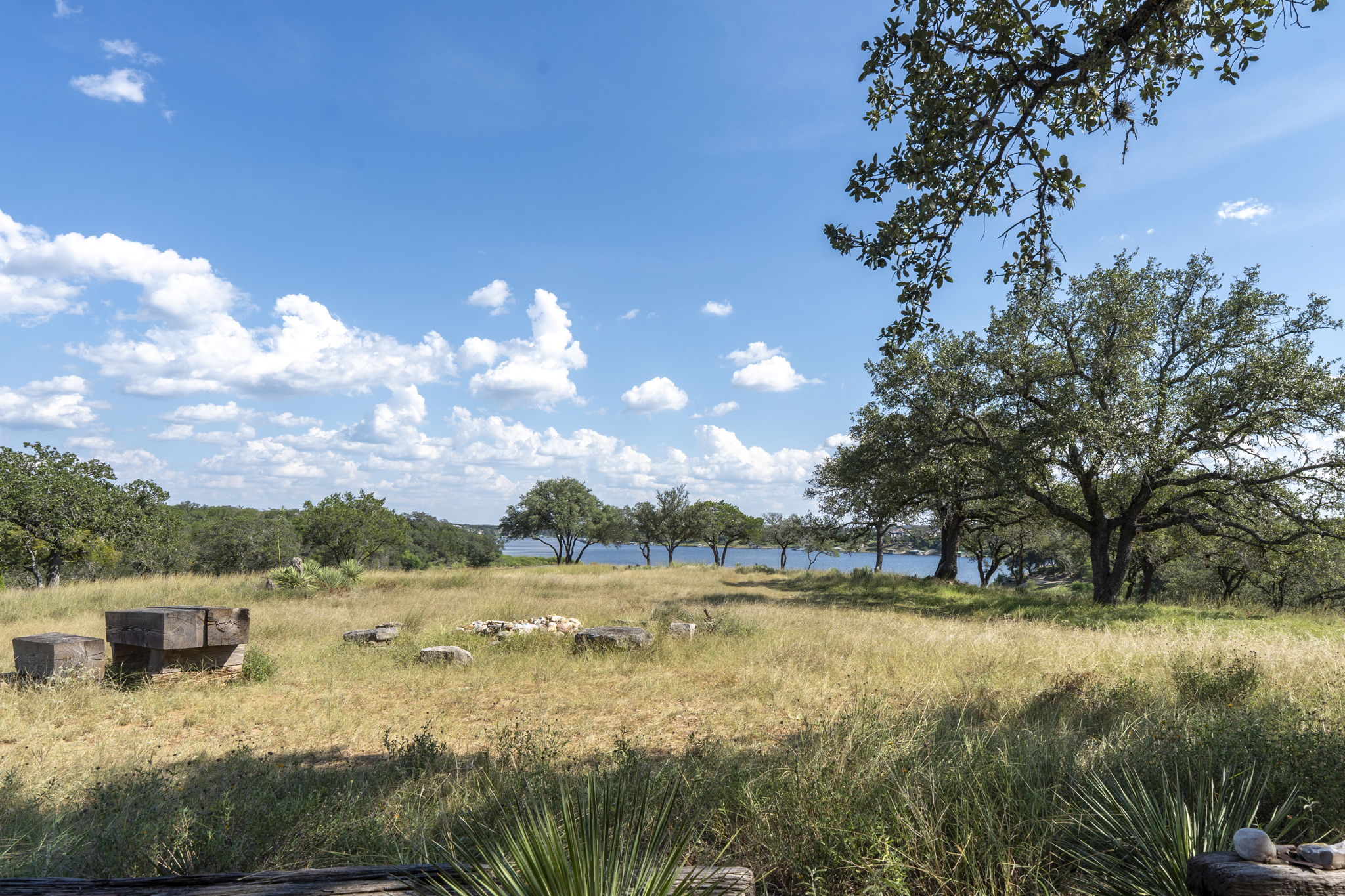 Tbd Singleton Road Marble Falls, TX 78654 - Photo 20 of 40 a view of a lake with houses in the background
