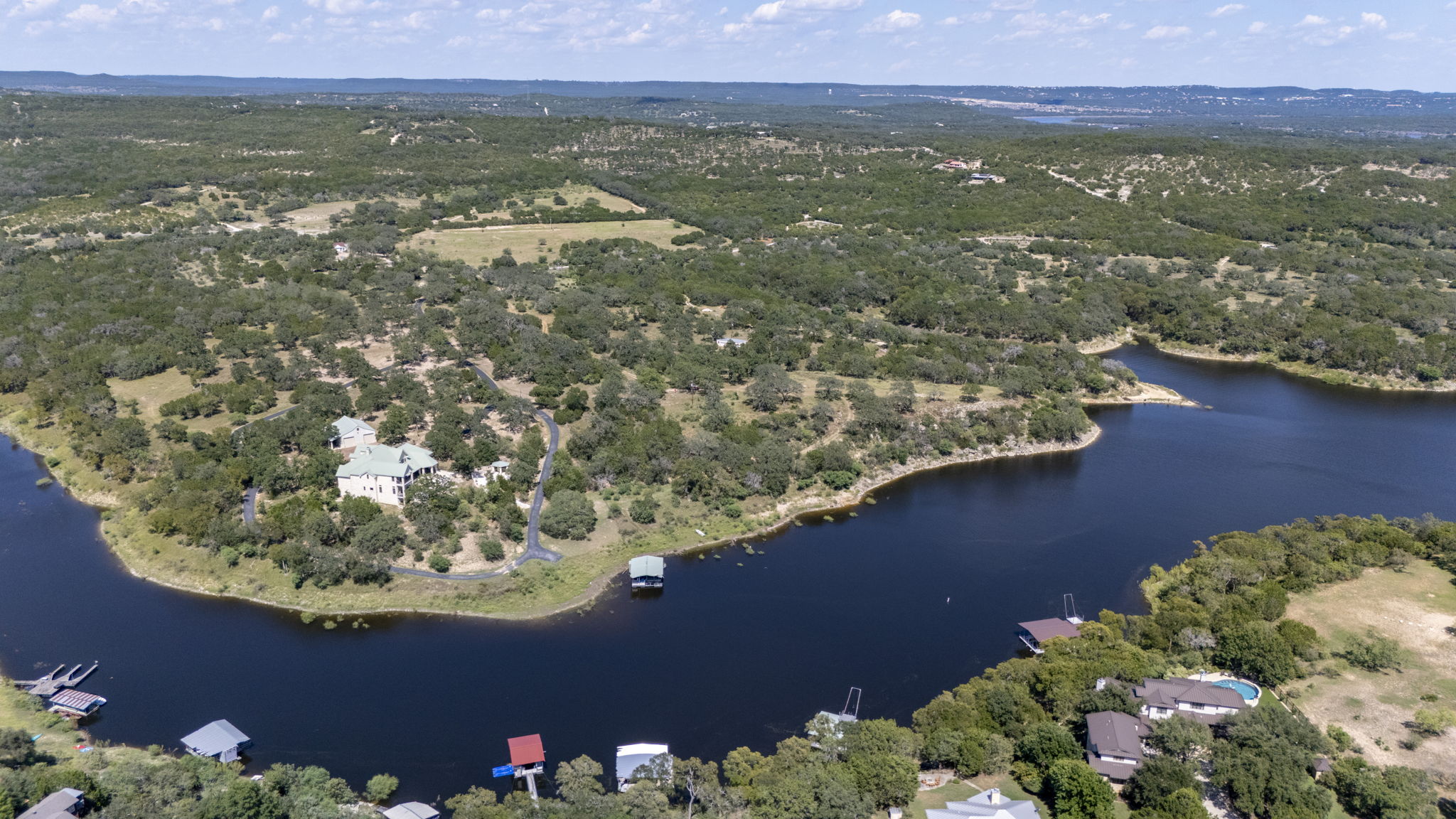 Tbd Singleton Road Marble Falls, TX 78654 - Photo 4 of 40 a view of a lake with a mountain in the background