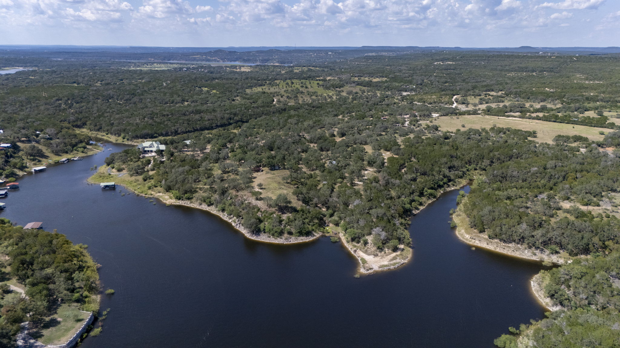 Tbd Singleton Road Marble Falls, TX 78654 - Photo 9 of 40 an aerial view of a house with a lake view