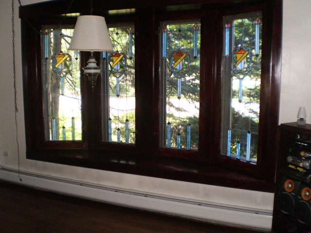 197 Longcommon Road Riverside, IL 60546 - Photo 4 of 25 a living room with furniture and a large window