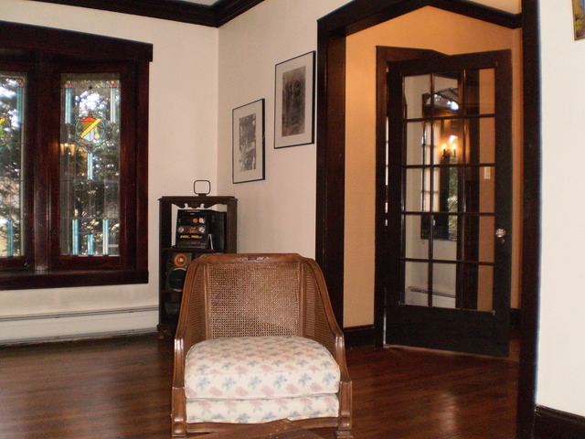 197 Longcommon Road Riverside, IL 60546 - Photo 6 of 25 a very nice looking room with wooden floor and a large window