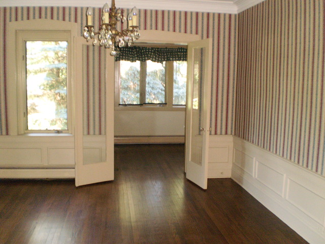 197 Longcommon Road Riverside, IL 60546 - Photo 7 of 25 a view of a room with wooden floor and staircase
