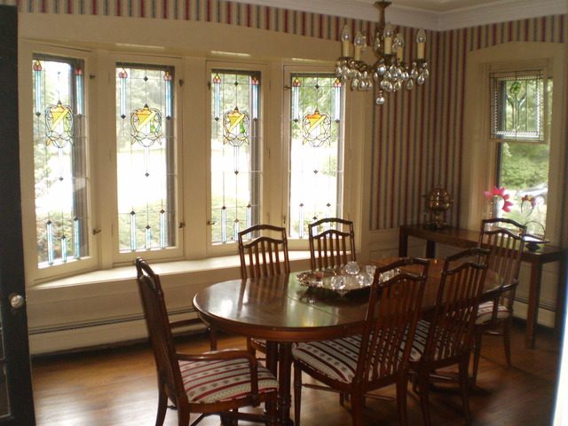 197 Longcommon Road Riverside, IL 60546 - Photo 8 of 25 a view of a dining room with furniture window and wooden floor