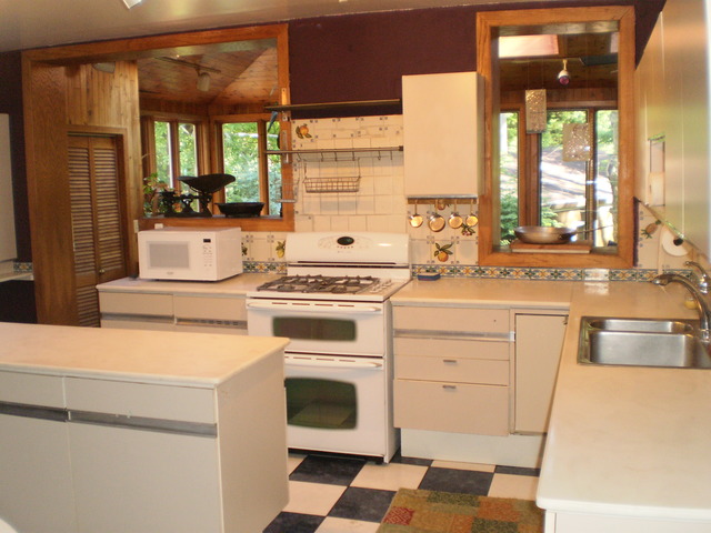 197 Longcommon Road Riverside, IL 60546 - Photo 10 of 25 a kitchen with a stove oven and sink