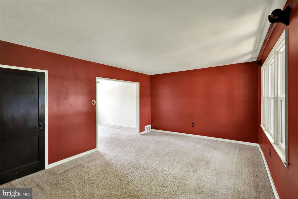 309 Sycamore Road Reading, PA 19611 - Photo 2 of 18 Living room with wall-to-wall carpet