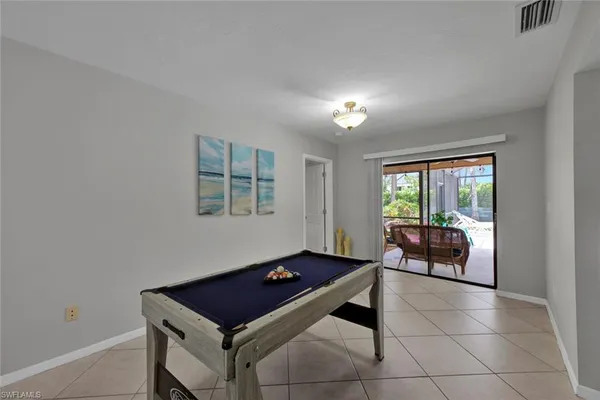 a room with furniture and a window
