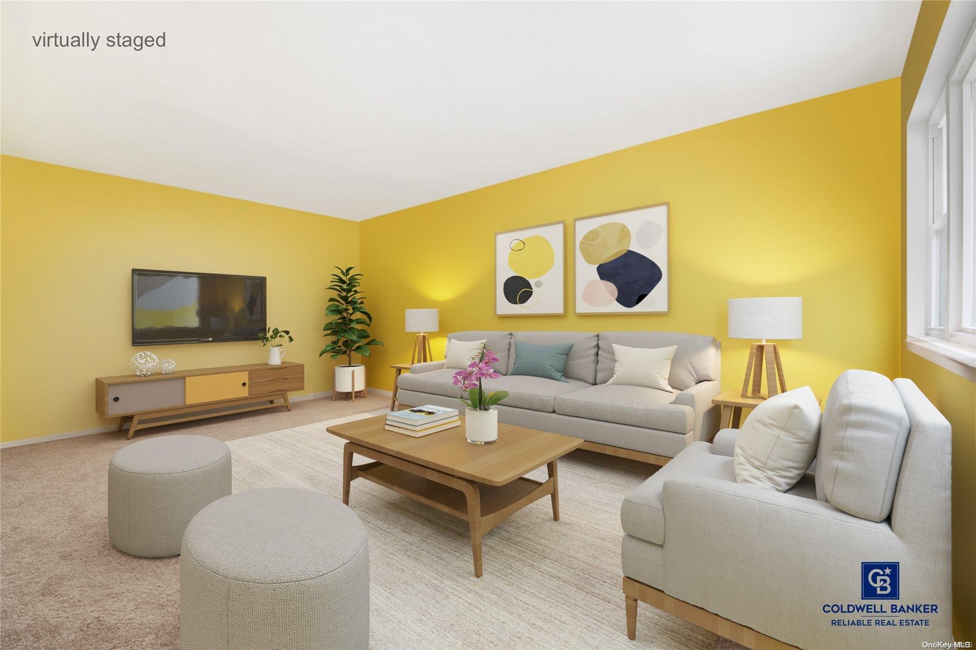 a living room with furniture and a flat screen tv