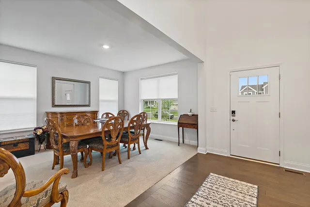 a view of a livingroom with furniture window and wooden floor