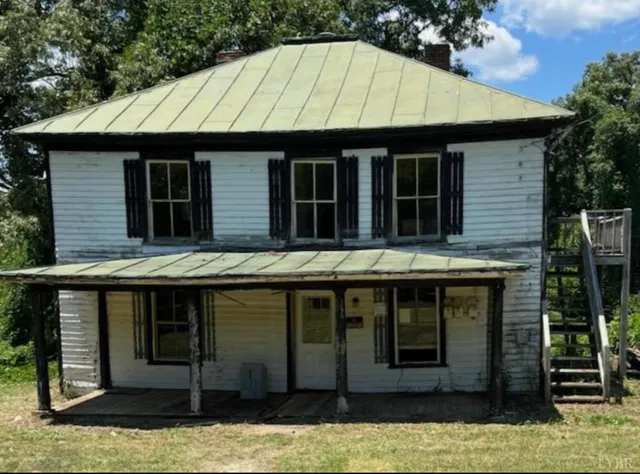 a house view with a swimming pool