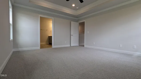 a bathroom with a shower and a toilet