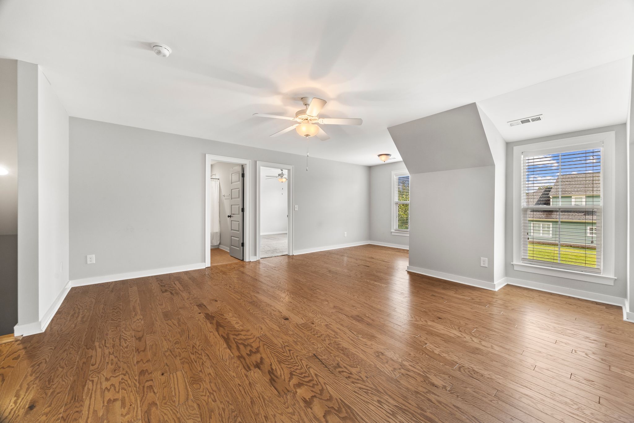 5001 Ryecroft Lane Franklin, TN 37064 - Photo 14 of 19 a view of an empty room with window and wooden floor
