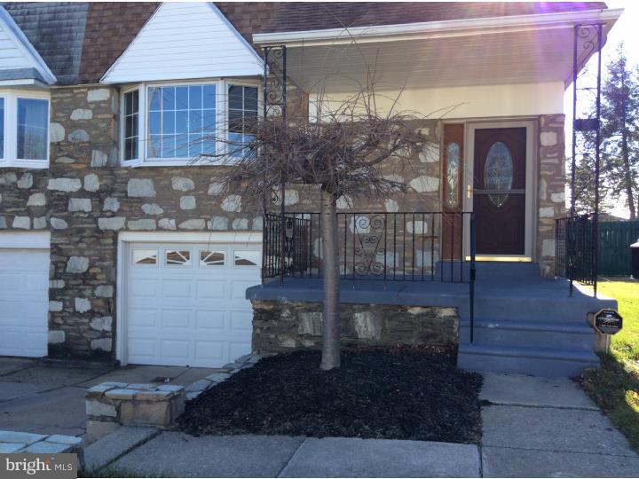 1152 R Norwalk Road Philadelphia, PA 19115 - Photo 2 of 20 a front view of a house with garden