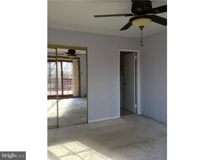 1152 R Norwalk Road Philadelphia, PA 19115 - Photo 13 of 20 a view of a hallway with closet