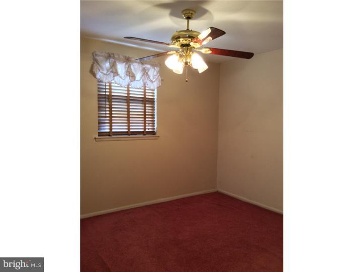 1152 R Norwalk Road Philadelphia, PA 19115 - Photo 14 of 20 a view of an empty room with a window