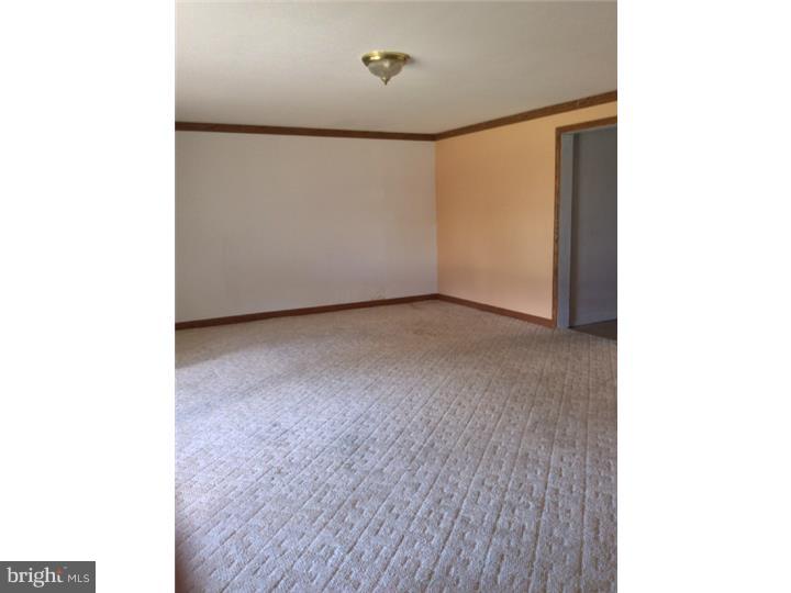 1152 R Norwalk Road Philadelphia, PA 19115 - Photo 17 of 20 a view of a room with wooden floor
