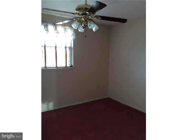 1152 R Norwalk Road Philadelphia, PA 19115 - Photo 6 of 20 a view of a chandelier fan of a room