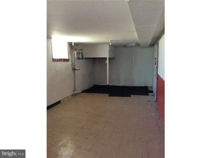 1152 R Norwalk Road Philadelphia, PA 19115 - Photo 10 of 20 a view of an empty room with wooden floor
