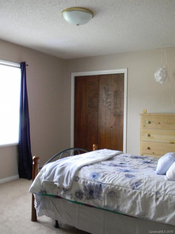 416 Willow Road Salisbury, NC 28147 - Photo 12 of 19 a bedroom with a bed and a window