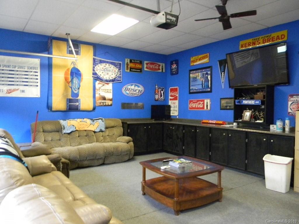 416 Willow Road Salisbury, NC 28147 - Photo 14 of 19 a living room with furniture and a flat screen tv