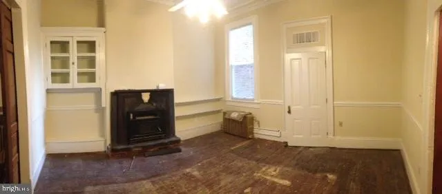 a view of an empty room and window