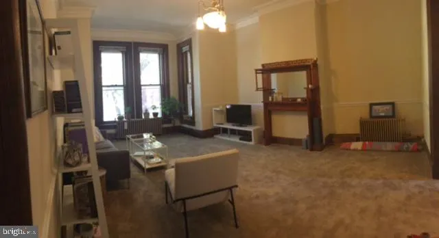 a room with furniture and window