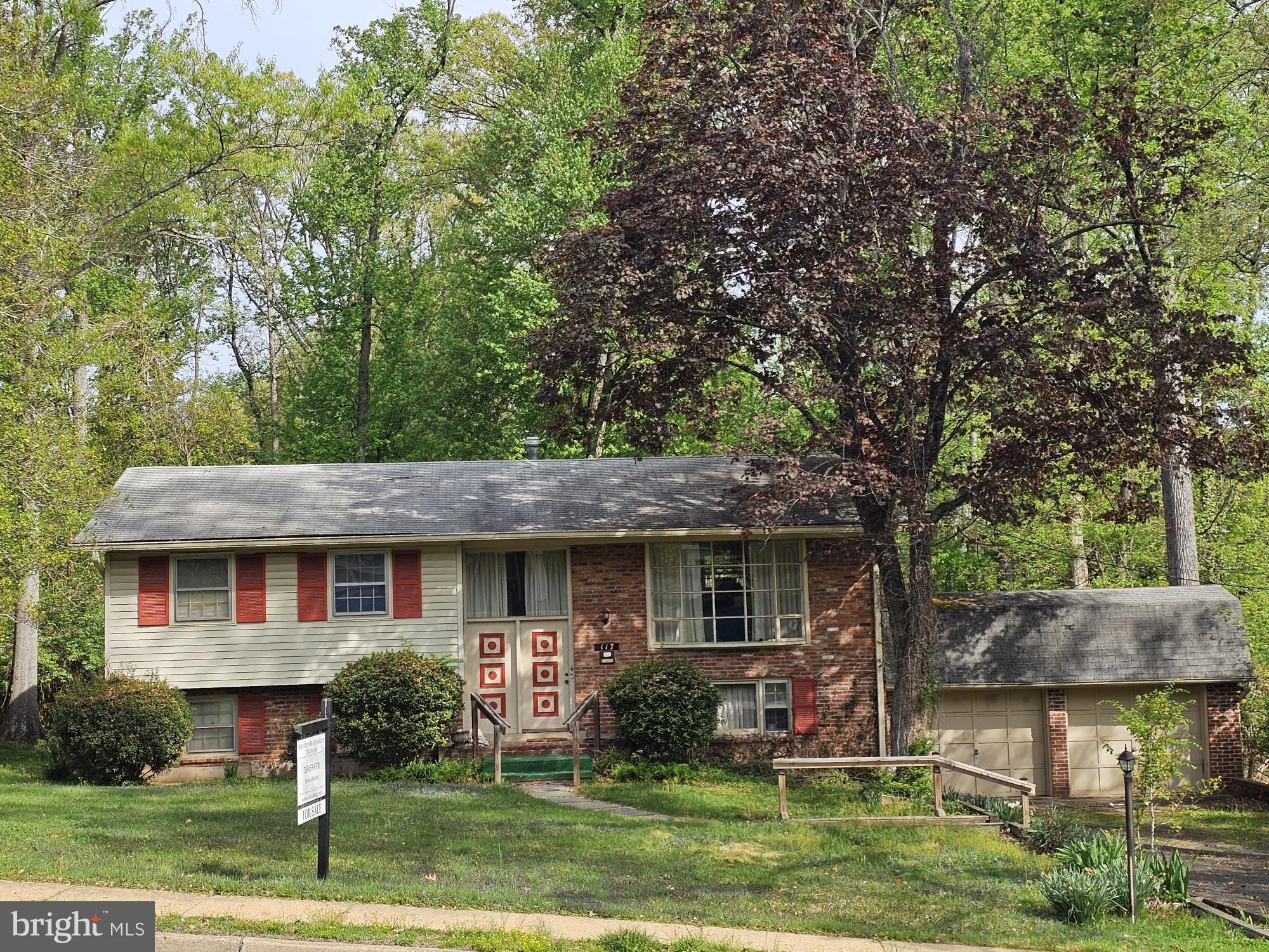 Charming split-level home in nature's embrace.