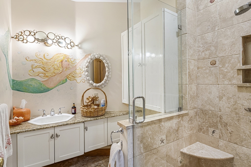 94 Howland Road Westport, MA 02790 - Photo 10 of 33 a bathroom with a sink and a mirror