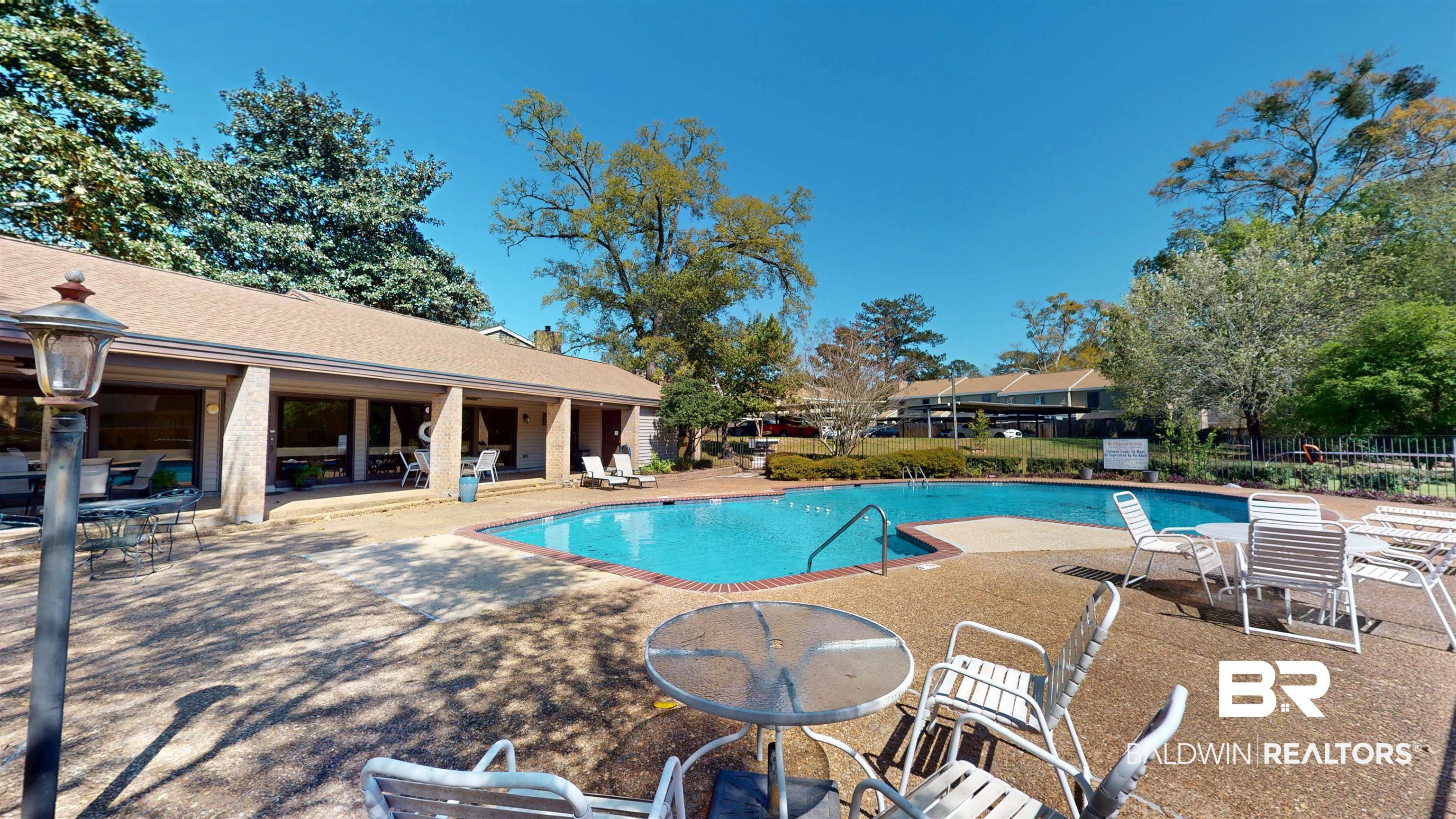 2901 Grant Street, Unit 902 Mobile, AL 36606 - Photo 28 of 35 Community pool featuring a patio