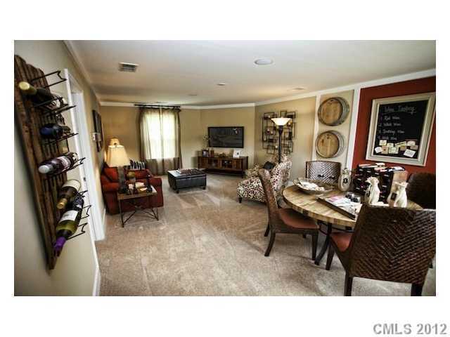 4022 Perth Road, Unit 169 Indian Land, SC 29707 - Photo 5 of 10 a living room with furniture and a flat screen tv