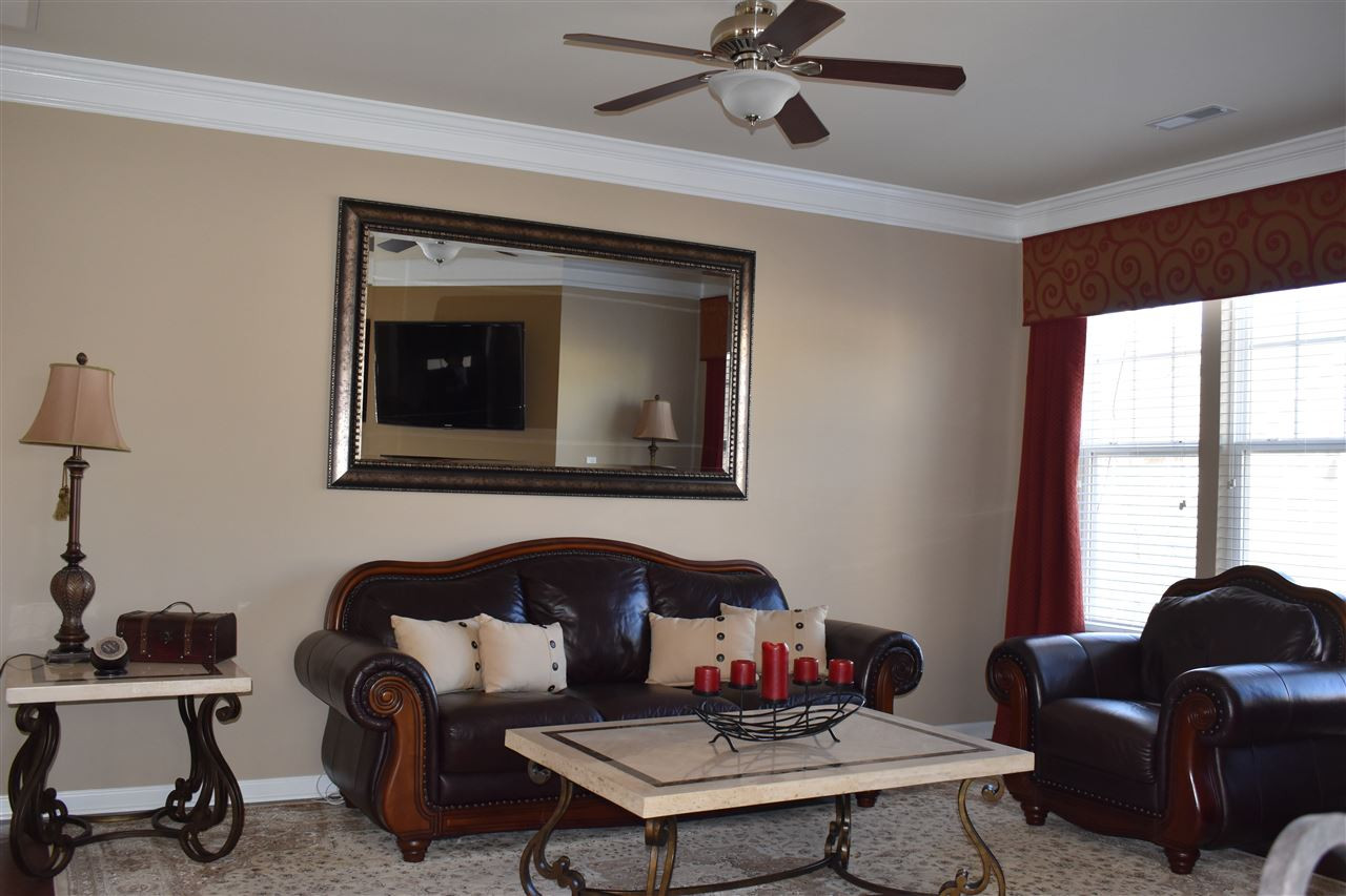 9130 Falkwood Road Raleigh, NC 27617 - Photo 5 of 23 Bright Open Family Room with Hardwood Floors
