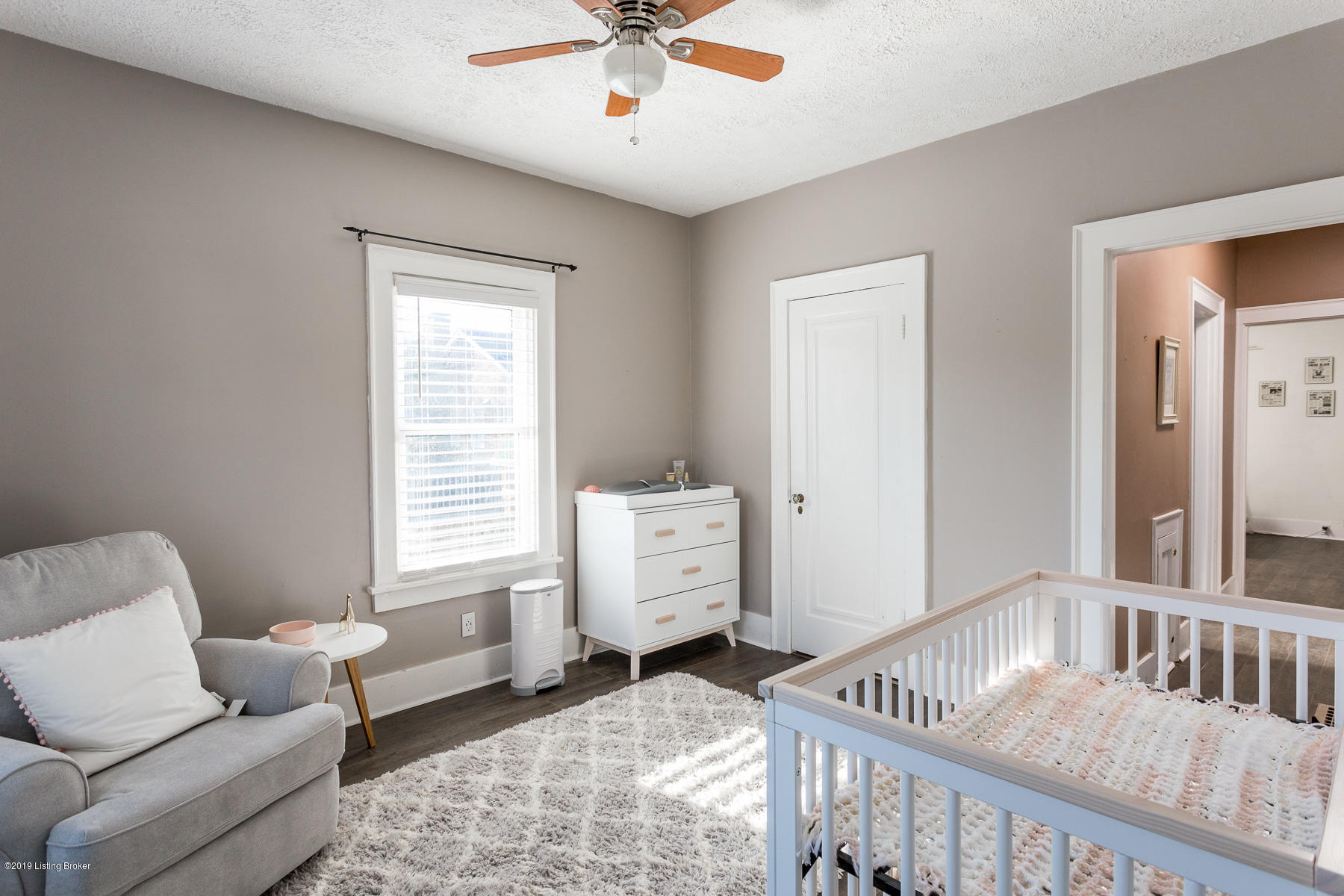 318 Iola Road Louisville, KY 40207 - Photo 19 of 28 First Floor Bedroom with newly installed Smart Core, Savannah Oak Vinyl Flooring